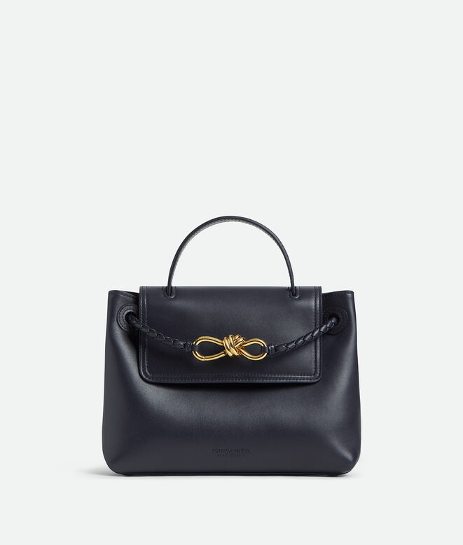 Top handle bag in silky calf leather with two-way flap and signature knot detail. Features a hidden hook closure, allowing the flap to be closed in the front or attached to the interior Intrecciato pocket., , hi-res
