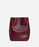 Bucket bag in silky calf leather with signature knot detail and sliding shoulder strap., , hi-res