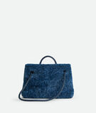 Top handle bag in merino shearling with denim effect. Featuring signature knot detail and sliding cross-body strap., , hi-res