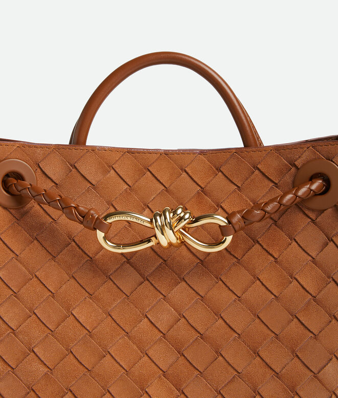 Top handle bag in Intrecciato suede with signature knot detail and sliding cross-body strap., , hi-res