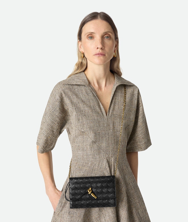 Pouch in Intrecciato nappa leather with signature knot closure and metal chain., , hi-res