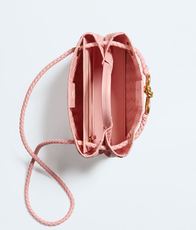 Top handle bag in supple Intrecciato leather with signature knot detail and sliding cross-body strap., , hi-res