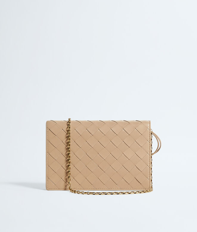 Pouch in Intrecciato nappa leather with signature knot closure and metal chain., , hi-res