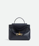 Top handle bag in silky calf leather with two-way flap and signature knot detail. Features a hidden hook closure, allowing the flap to be closed in the front or attached to the interior Intrecciato pocket., , hi-res