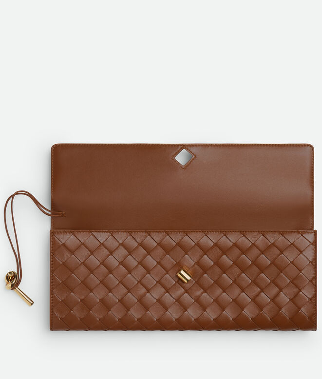 Top handle clutch in Intrecciato leather with signature knot closure., , hi-res
