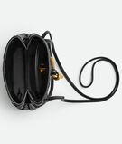 Phone pouch in Intrecciato nappa leather with signature knot closure and sliding strap., , hi-res