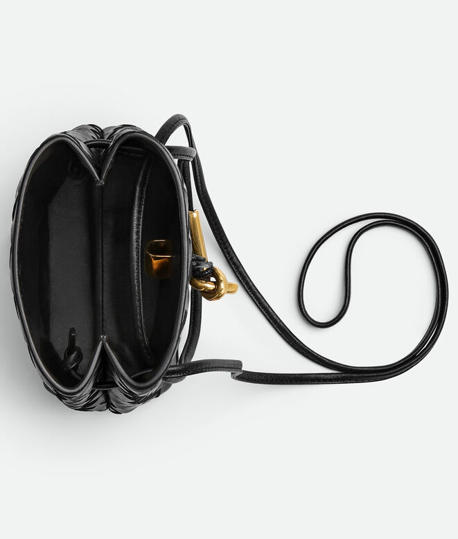 Phone pouch in Intrecciato nappa leather with signature knot closure and sliding strap., , hi-res