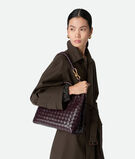 Top handle bag in supple Intrecciato leather with signature knot detail and sliding cross-body strap., , hi-res