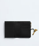 Small bi-fold wallet in Intrecciato nappa leather with signature knot detail. , , hi-res