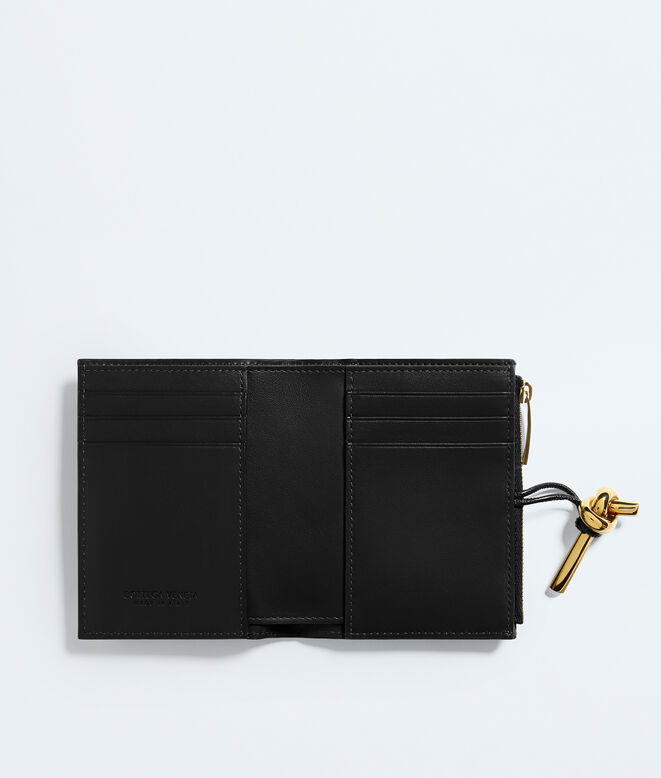 Small bi-fold wallet in Intrecciato nappa leather with signature knot detail. , , hi-res