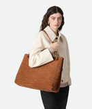 Top handle bag in Intrecciato suede with signature knot detail and sliding cross-body strap., , hi-res