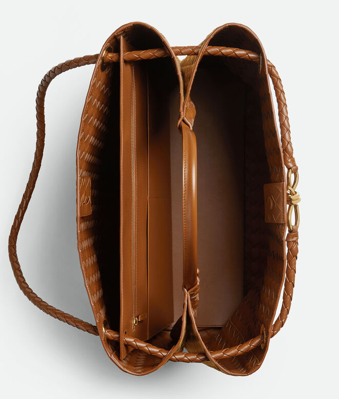 Top handle bag in Intrecciato suede with signature knot detail and sliding cross-body strap., , hi-res