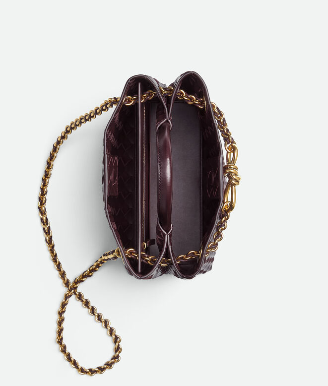 Top handle bag in supple Intrecciato leather with signature knot detail and tubular leather braided metal chain., , hi-res
