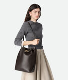 Bucket bag in silky calf leather with signature knot detail and sliding shoulder strap., , hi-res