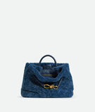 Top handle bag in merino shearling with denim effect. Featuring signature knot detail and sliding cross-body strap., , hi-res