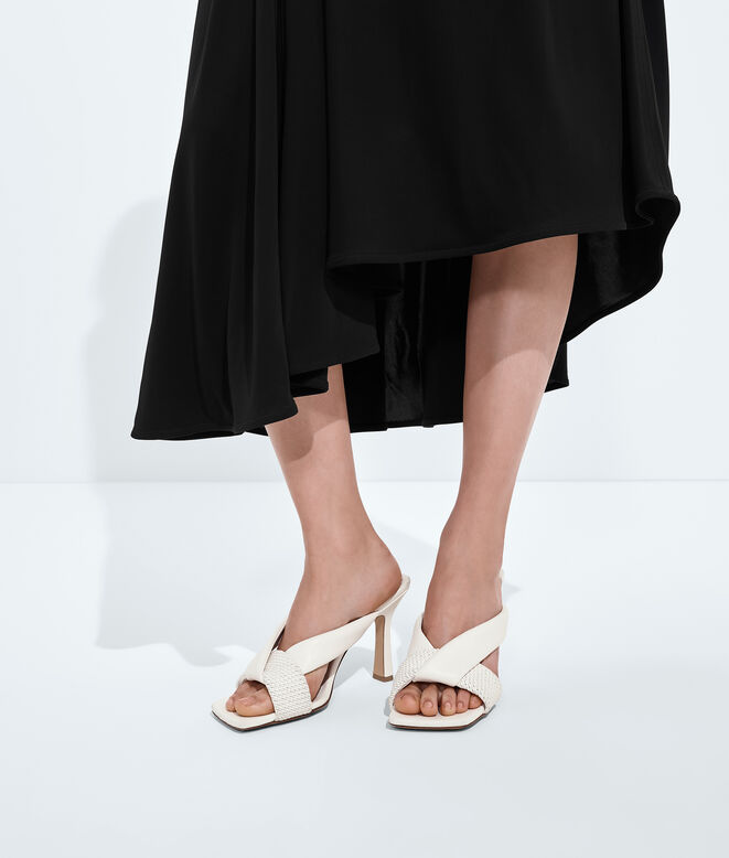Mule sandal in smooth and micro Intrecciato leather with padded tubular straps and twisted design., , hi-res