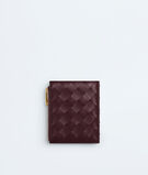 Small bi-fold wallet in Intrecciato nappa leather with contrasted interior., , hi-res