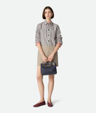 Top handle bag in Intrecciato leather with signature knot detail and tubular leather braided metal chain., , hi-res