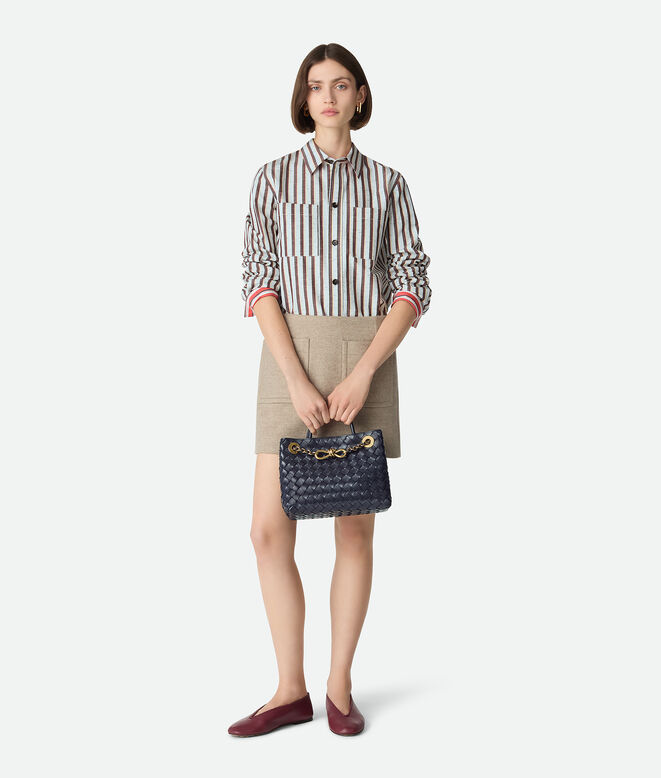 Top handle bag in Intrecciato leather with signature knot detail and tubular leather braided metal chain., , hi-res