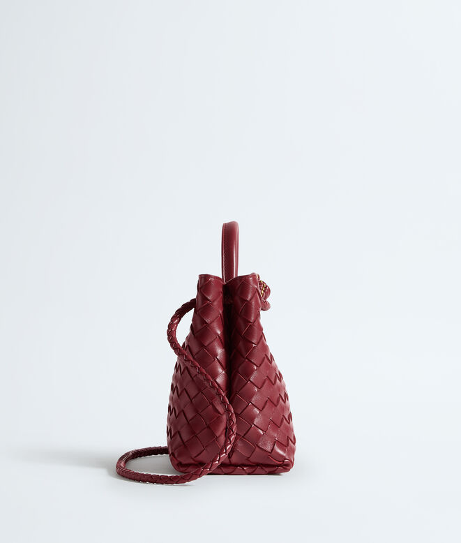 Top handle bag in supple Intrecciato leather, featuring a smooth leather covered signature knot detail and sliding cross-body strap., , hi-res