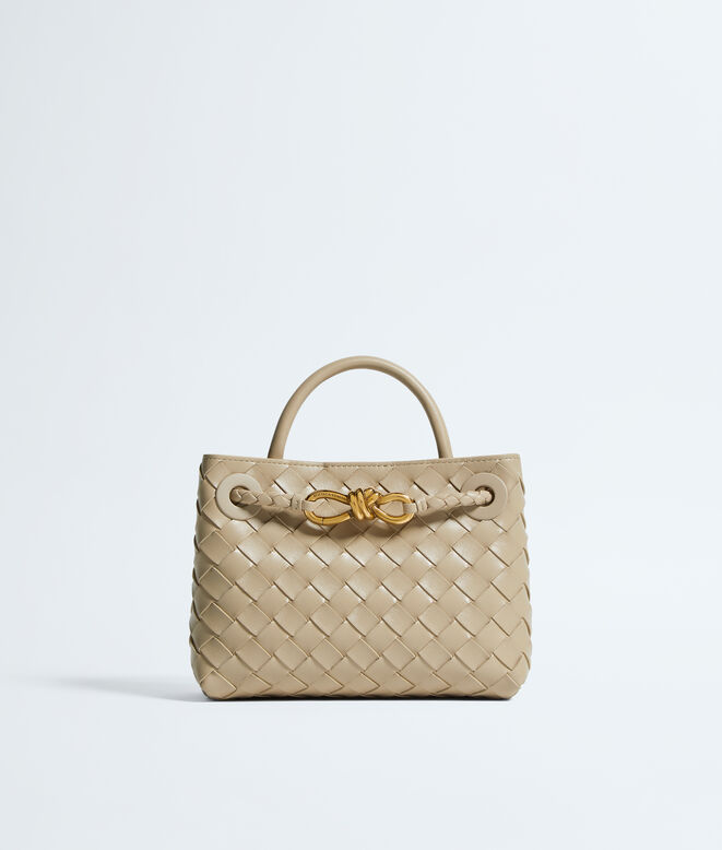 Top handle bag in supple Intrecciato leather with signature knot detail and sliding cross-body strap., , hi-res