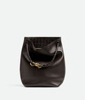 Bucket bag in silky calf leather with signature knot detail and sliding shoulder strap.