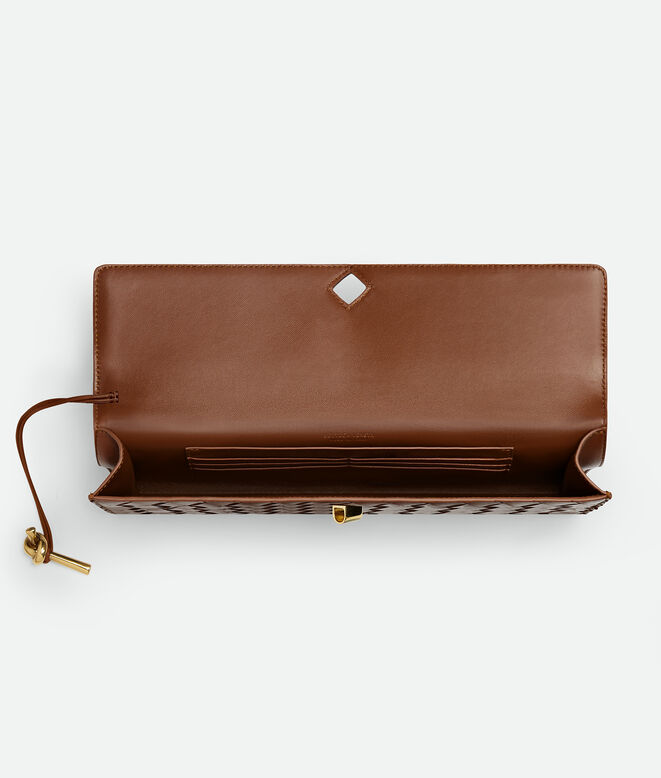 Top handle clutch in Intrecciato leather with signature knot closure., , hi-res