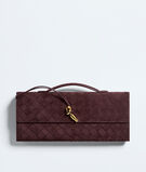 Top handle clutch in supple Intrecciato suede with signature knot closure., , hi-res