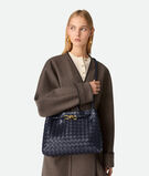 Top handle bag in Intrecciato leather with signature knot detail and sliding cross-body strap., , hi-res