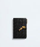 Medium bi-fold wallet in Intrecciato nappa leather, featuring a signature knot detail., , hi-res