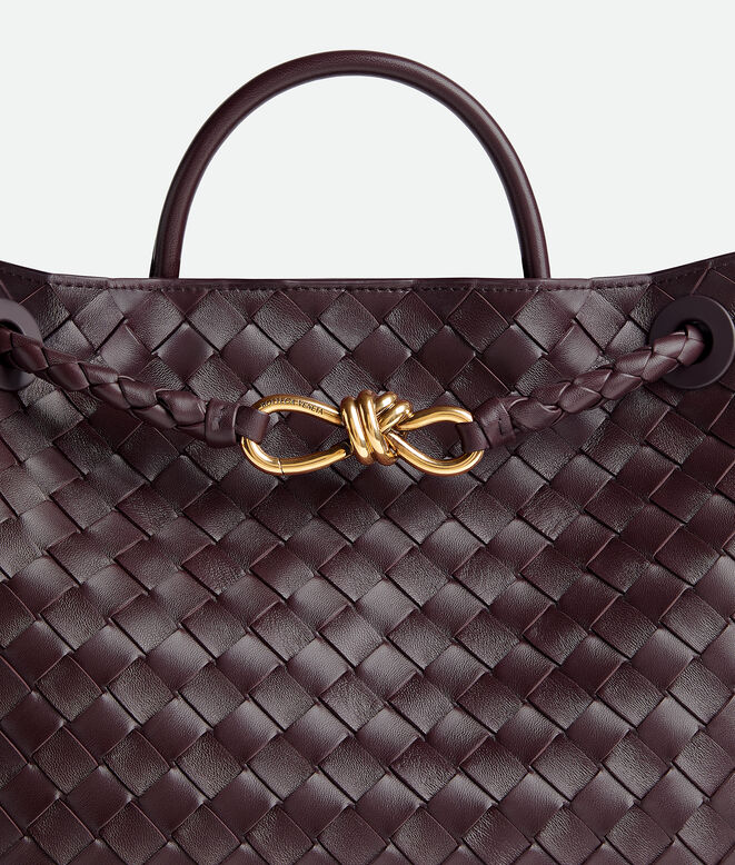 Top handle bag in supple Intrecciato leather with signature knot detail and sliding cross-body strap., , hi-res