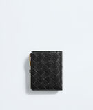 Small bi-fold wallet in Intrecciato nappa leather with signature knot detail. , , hi-res
