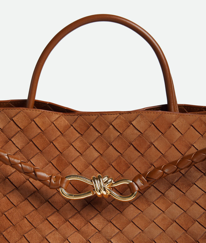Top handle bag in Intrecciato suede with signature knot detail and sliding cross-body strap., , hi-res