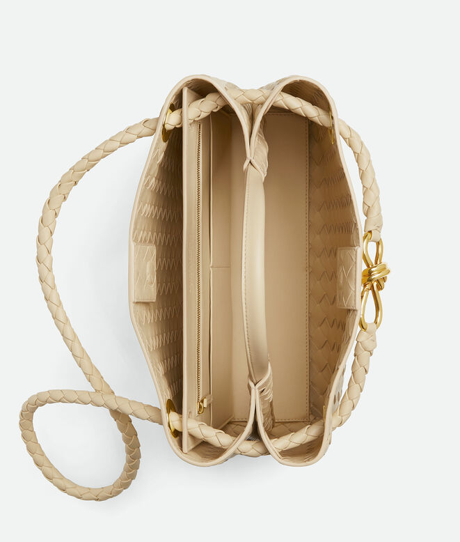 Top handle bag in supple Intrecciato leather with signature knot detail and sliding cross-body strap., , hi-res