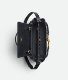 Top handle bag in silky calf leather with two-way flap and signature knot detail. Features a hidden hook closure, allowing the flap to be closed in the front or attached to the interior Intrecciato pocket., , hi-res