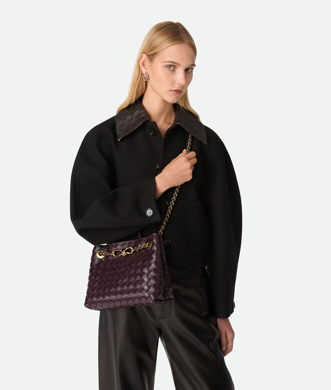 Top handle bag in supple Intrecciato leather with signature knot detail and tubular leather braided metal chain., , hi-res