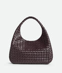 Shoulder bag with archival silhouette in supple Intrecciato leather with tie closure.