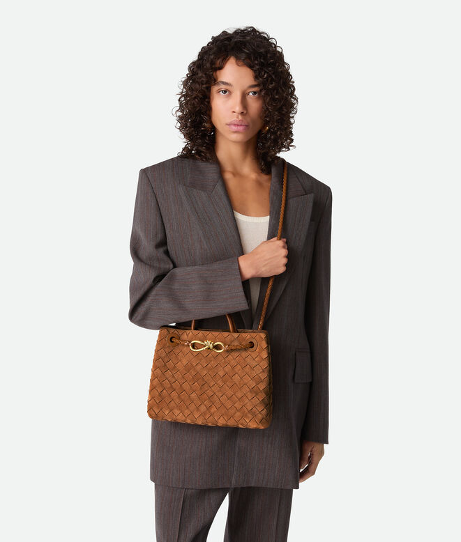Top handle bag in Intrecciato suede with signature knot detail and sliding cross-body strap., , hi-res