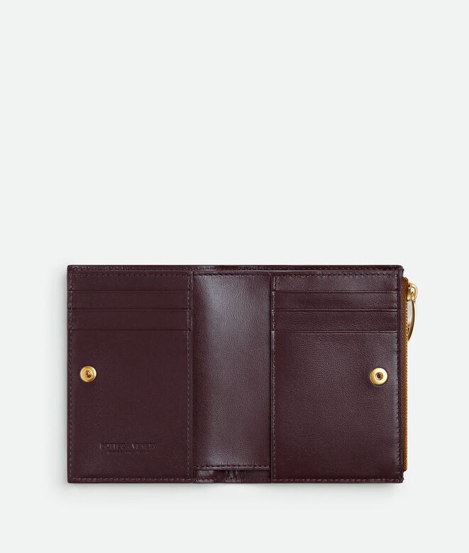 Small bi-fold wallet in Intrecciato nappa leather with contrasted interior., , hi-res