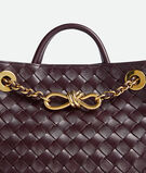 Top handle bag in supple Intrecciato leather with signature knot detail and tubular leather braided metal chain., , hi-res