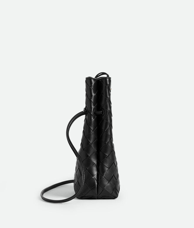 Phone pouch in Intrecciato nappa leather with signature knot closure and sliding strap., , hi-res