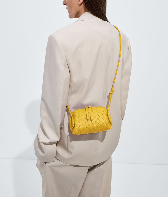 Pouch in Intrecciato nappa leather with adjustable tubular strap featuring sliding knot details., , hi-res