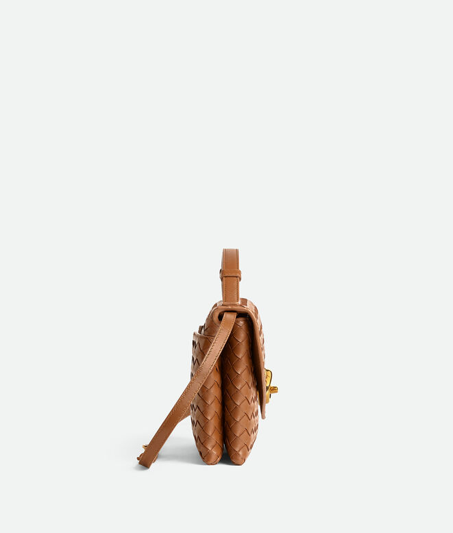 Cross-body bag in Intrecciato piccolo leather with adjustable top handle and sculptural knot closure., , hi-res