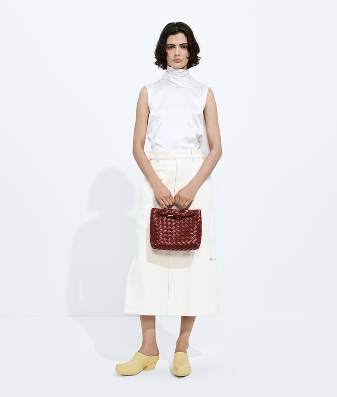 Top handle bag in supple Intrecciato leather, featuring a smooth leather covered signature knot detail and sliding cross-body strap., , hi-res