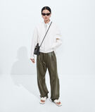 Top handle bag in supple Intrecciato leather with signature knot detail and sliding cross-body strap., , hi-res