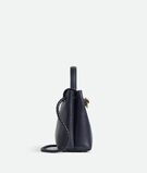 Top handle bag in silky calf leather with two-way flap and signature knot detail. Features a hidden hook closure, allowing the flap to be closed in the front or attached to the interior Intrecciato pocket., , hi-res