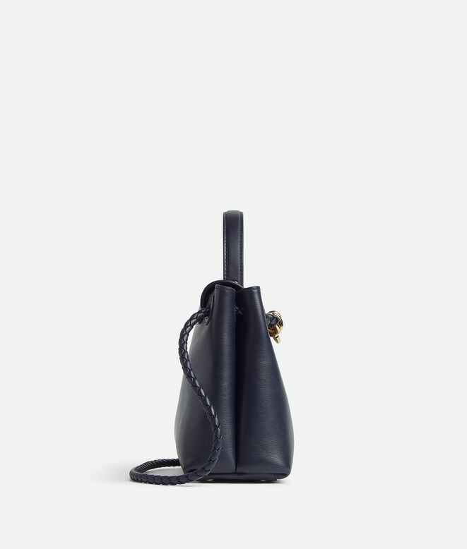 Top handle bag in silky calf leather with two-way flap and signature knot detail. Features a hidden hook closure, allowing the flap to be closed in the front or attached to the interior Intrecciato pocket., , hi-res