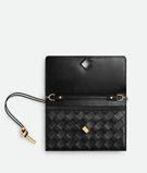 Pouch in Intrecciato nappa leather with signature knot closure and metal chain., , hi-res