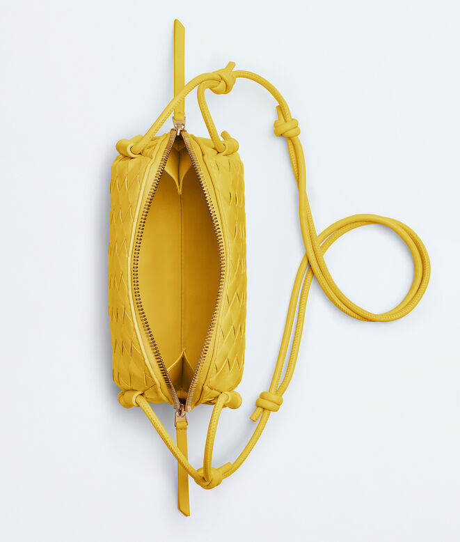 Pouch in Intrecciato nappa leather with adjustable tubular strap featuring sliding knot details., , hi-res