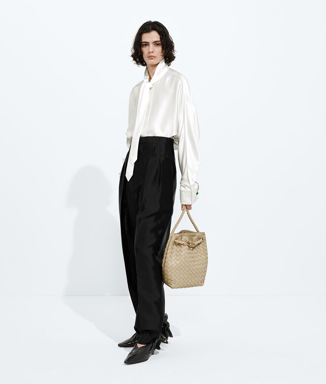 Bucket bag in supple Intrecciato leather with signature knot detail and sliding shoulder strap. , , hi-res